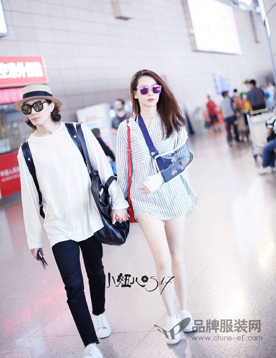 戚薇李承铉夫妇现身上海机场 两人十指紧扣高