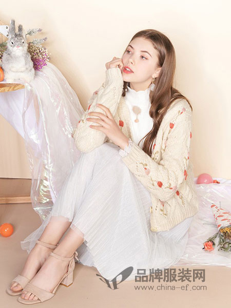 汤米诺女装品牌2019春夏镂空针织短款开衫女毛衣外套毛针织衫
