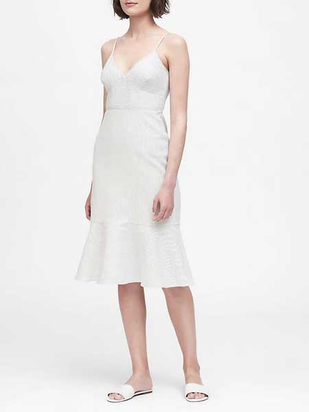 laura biagiotti女装品牌2019春夏新款白色文艺棉麻高腰系带荷叶边吊带连衣裙