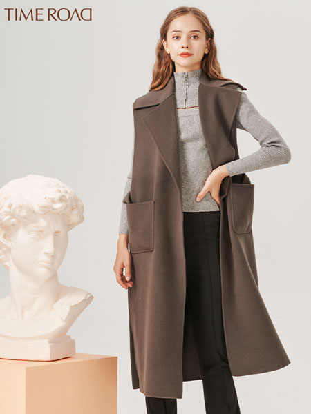 汤米诺女装品牌2021冬季长款时尚无袖马甲