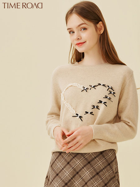 汤米诺女装品牌2021冬季刺绣简约时尚毛衣