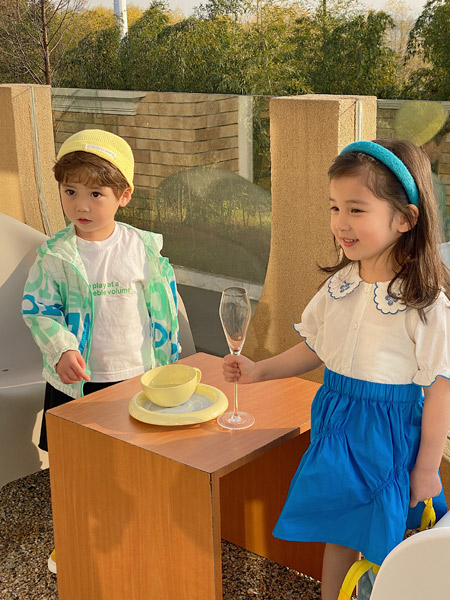 洛小米童装品牌2022夏季蓝色纯色设计感休闲女童半身裙
