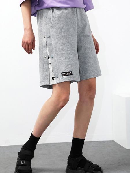 A02女装品牌2022夏季排扣拼接个性裤子