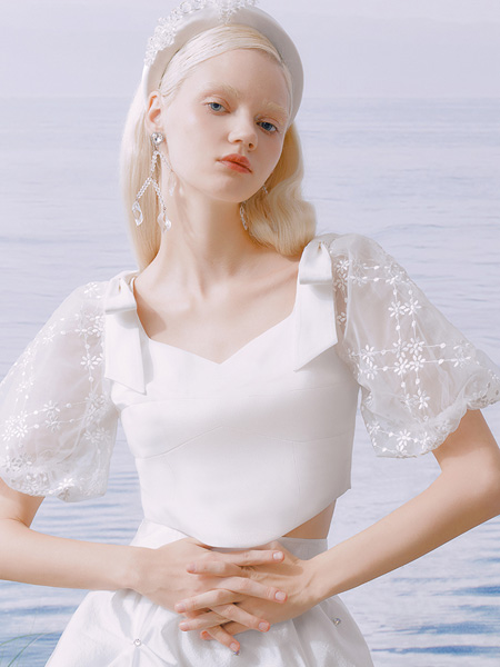 糖力潮品(TAMMYTANGS)女装品牌2022夏季拼接网纱小清新上衣