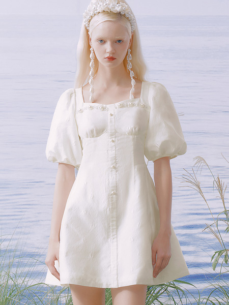 糖力潮品(TAMMYTANGS)女装品牌2022夏季排扣钉珠小清新连衣裙