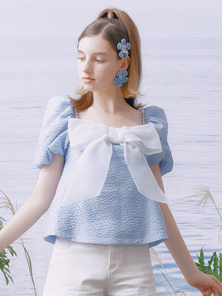 糖力潮品(TAMMYTANGS)女装品牌2022夏季网纱蝴蝶结甜美上衣